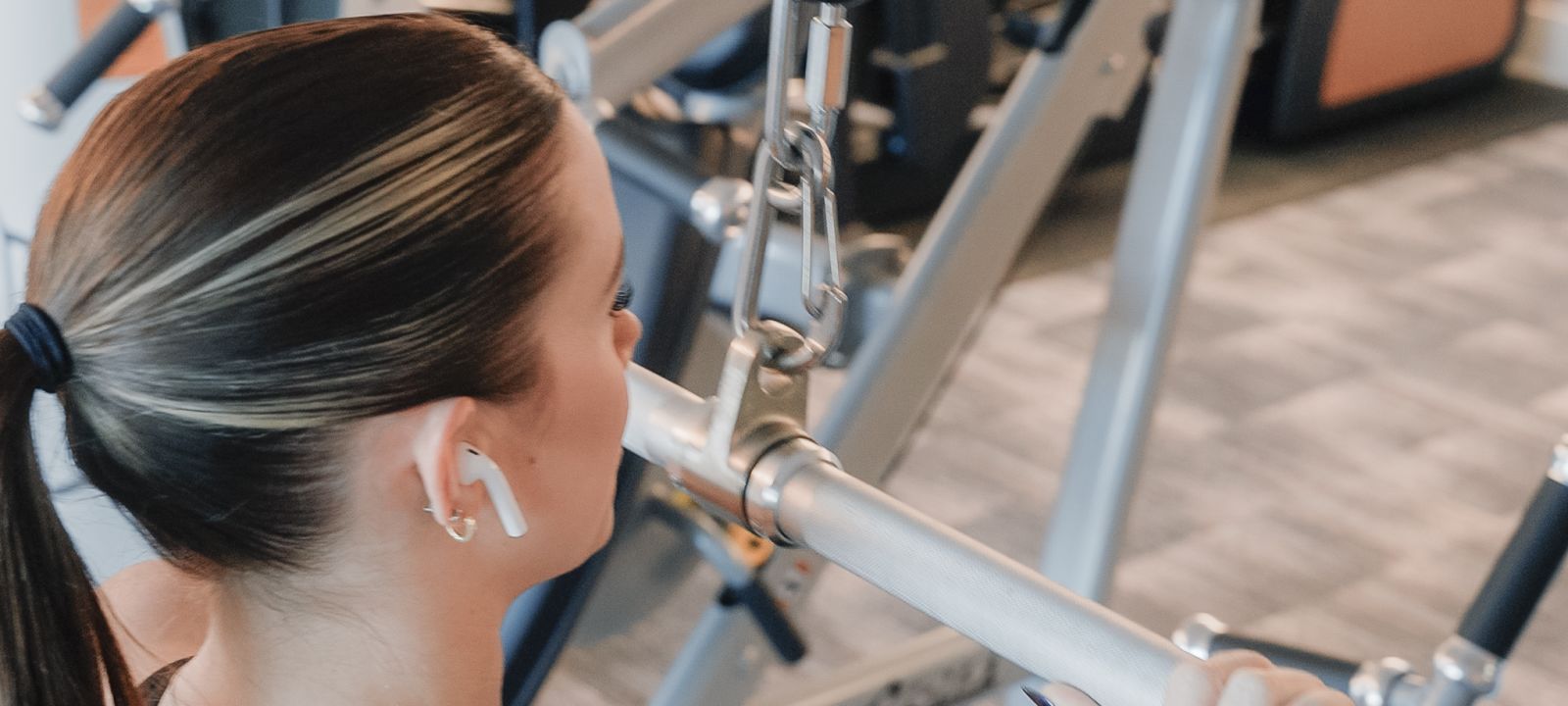 A Woman Working Out In A Gym