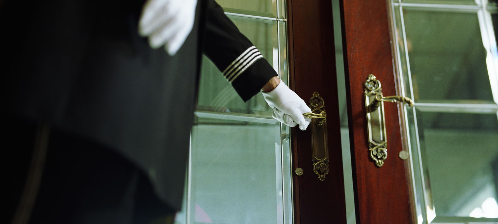 Doorman opening door